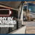 Motorhome battery compartment showing discharged RV batteries during storage, highlighting common battery drain and charging issues.